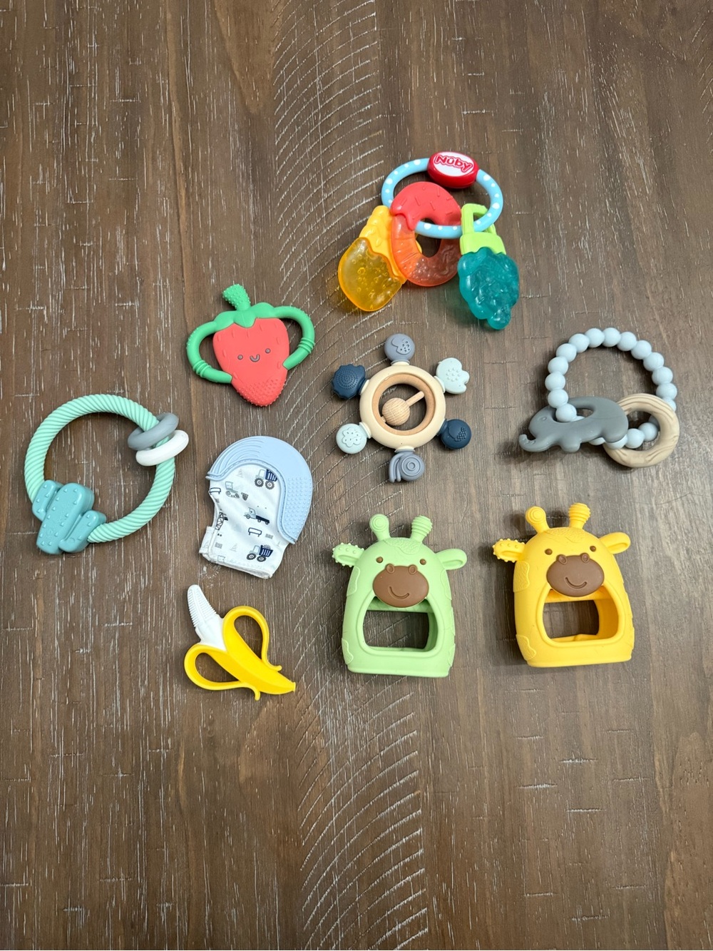 9 Itzy Ritzy, Infantino, Momcozy, & Nuby teethers